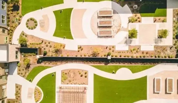 Aerial view of a courtyard in an apartment complex with synthetic turf