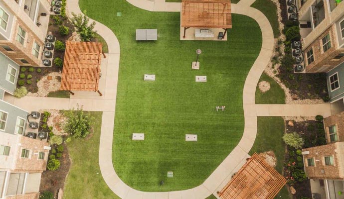 Outdoor event space featuring synthetic grass for a clean and green look