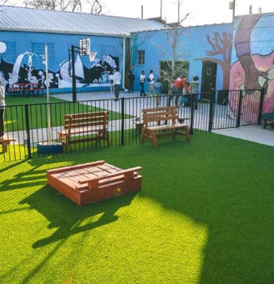 Installed artificial turf in commercial area Installed artificial turf at restaurant outdoor area