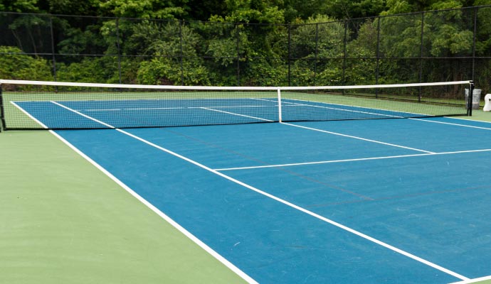 Tennis court turf in backyard Installed tennis court turf in backyard