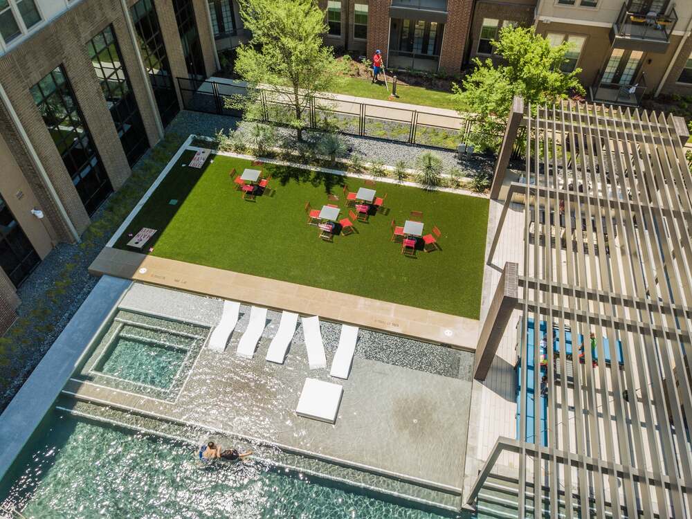Commercial Property Multifamily Living Amenity Lawn At The Realm in Lewisville