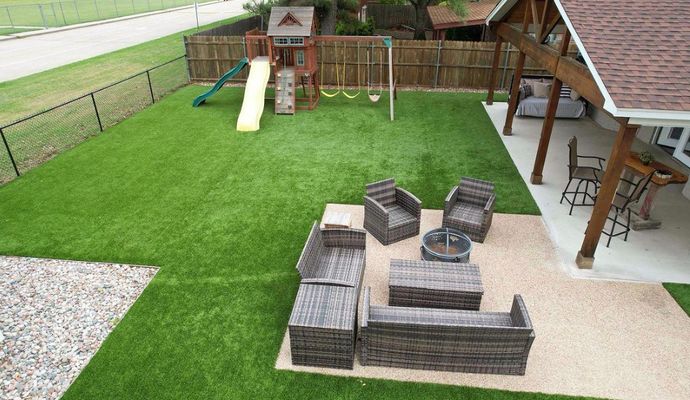 Synthetic grass installed in a residential backyard playground
