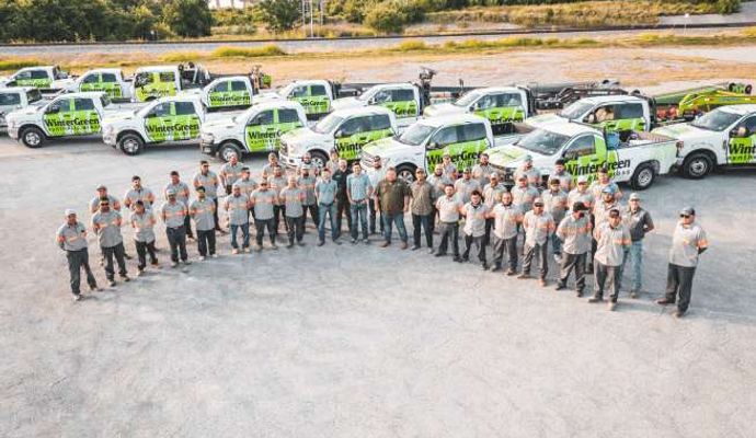 WinterGreen Synthetic Grass installation team with service vehicle WinterGreen Synthetic Grass installation team with service vehicle